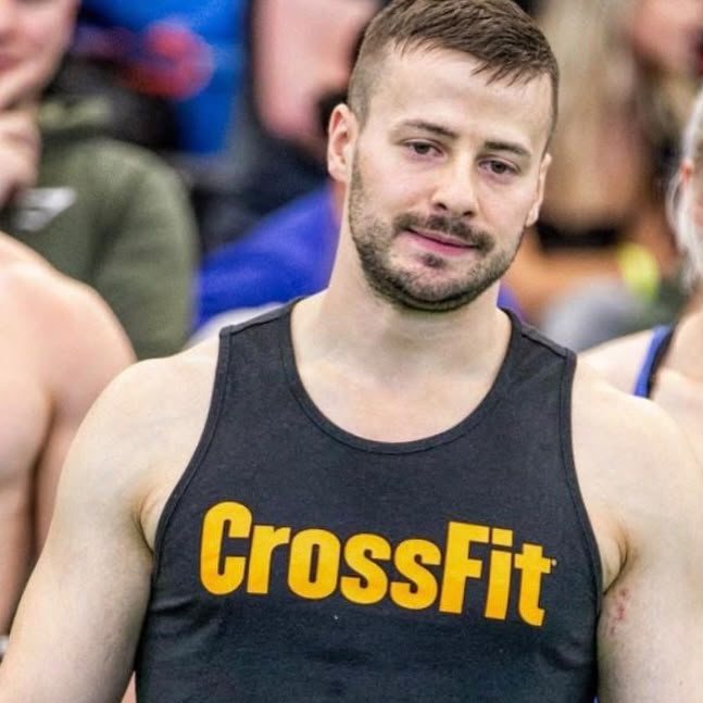 JP in a CrossFit vest at a competition